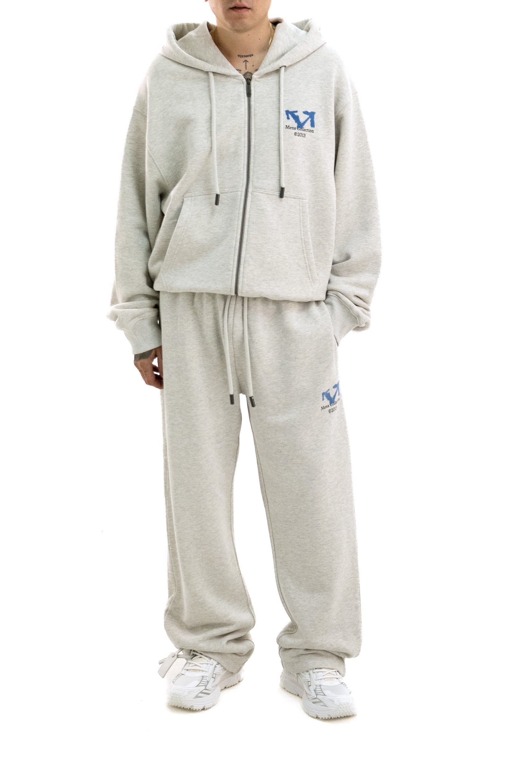 Pantaloni jogging in cotone di colore grigio<BR/> 44MCH05AF26F003060 GREY MELANGE OFF WHITE