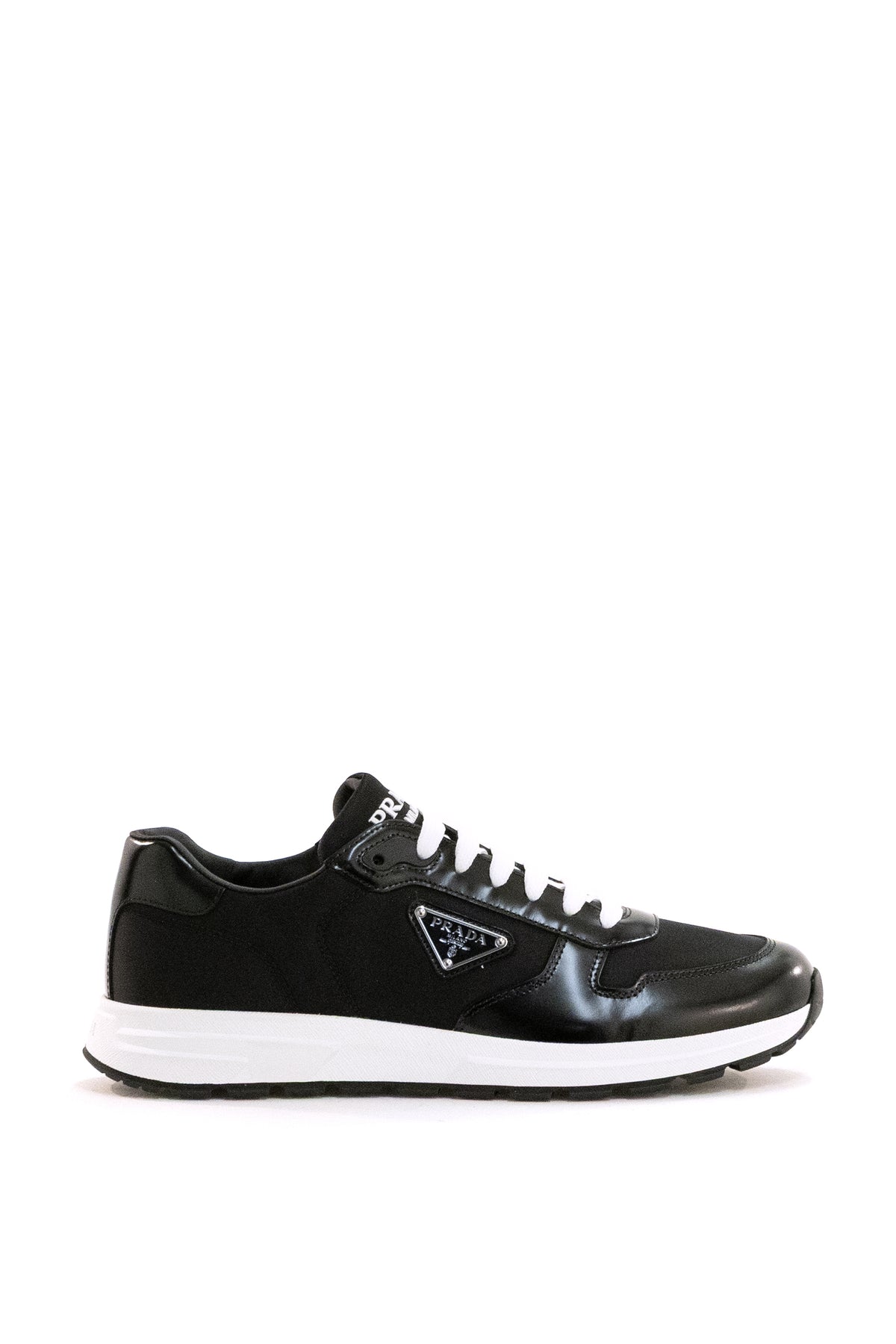 PRADA Sneakers Prax 01 in Re-Nylon e pelle spazzolata di colore nero