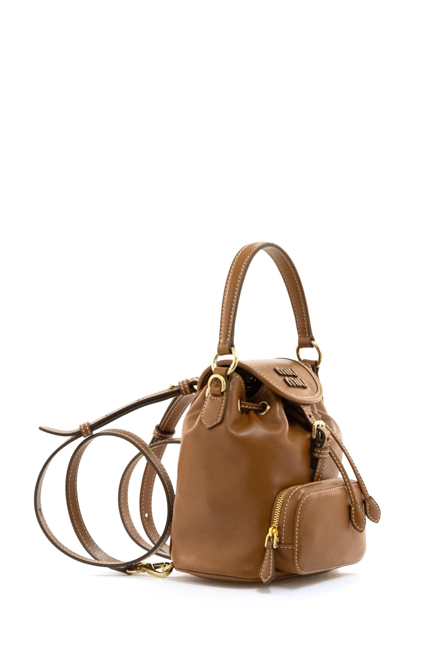 Mini zaino in pelle di colore marrone<BR/> 5BZ045 V OOM 2CRW F0046 MIU MIU