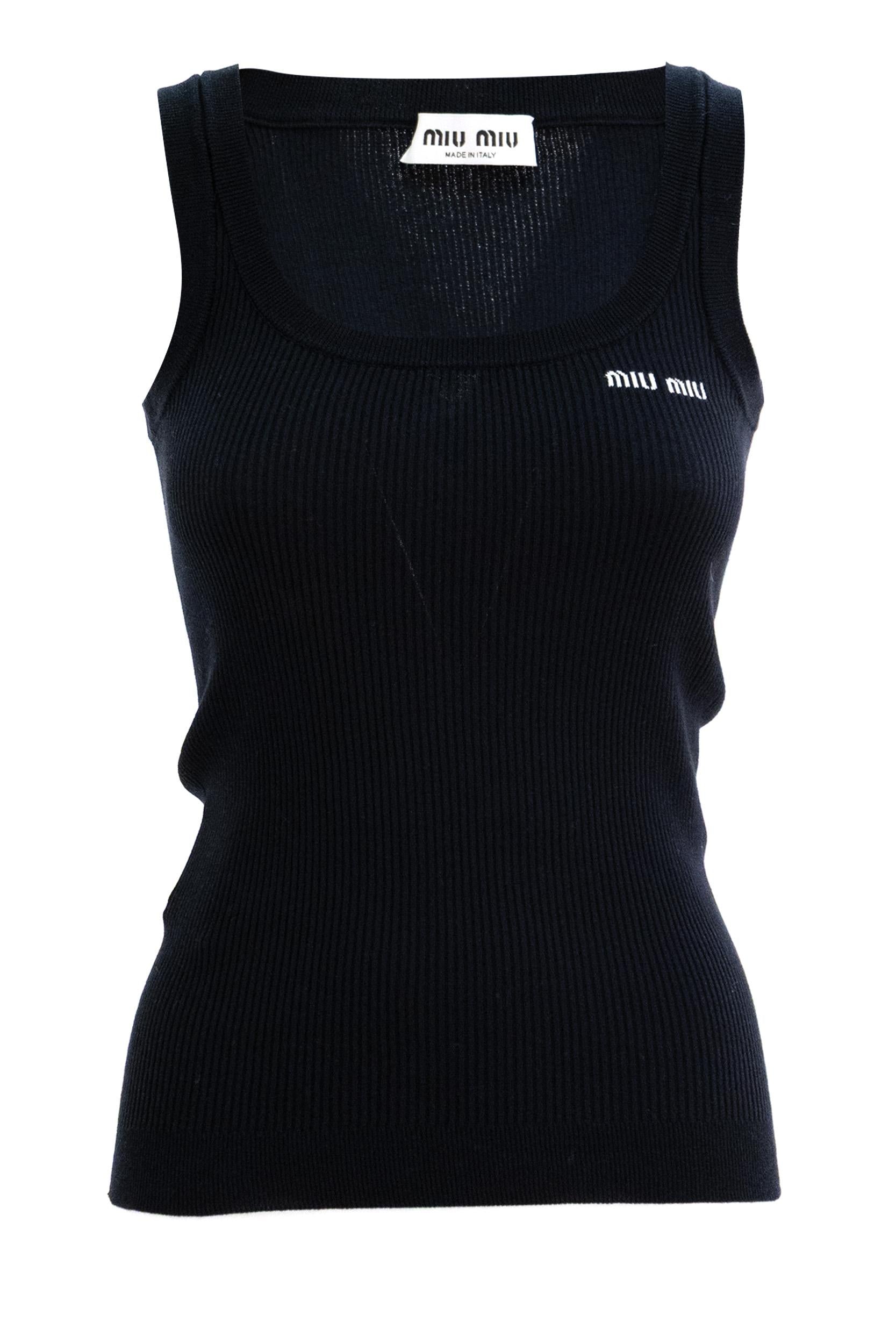 Top in cotone a coste sottili di colore blu<BR/> MMV294 S OOO 12ZL F0008 MIU MIU
