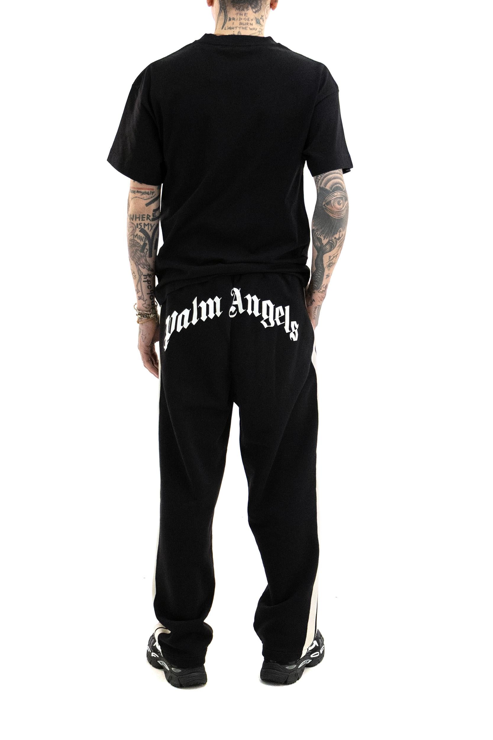 Pantaloni in cotone di colore nero<BR/> PMCH02OS26FLE001 1003 PALM ANGELS