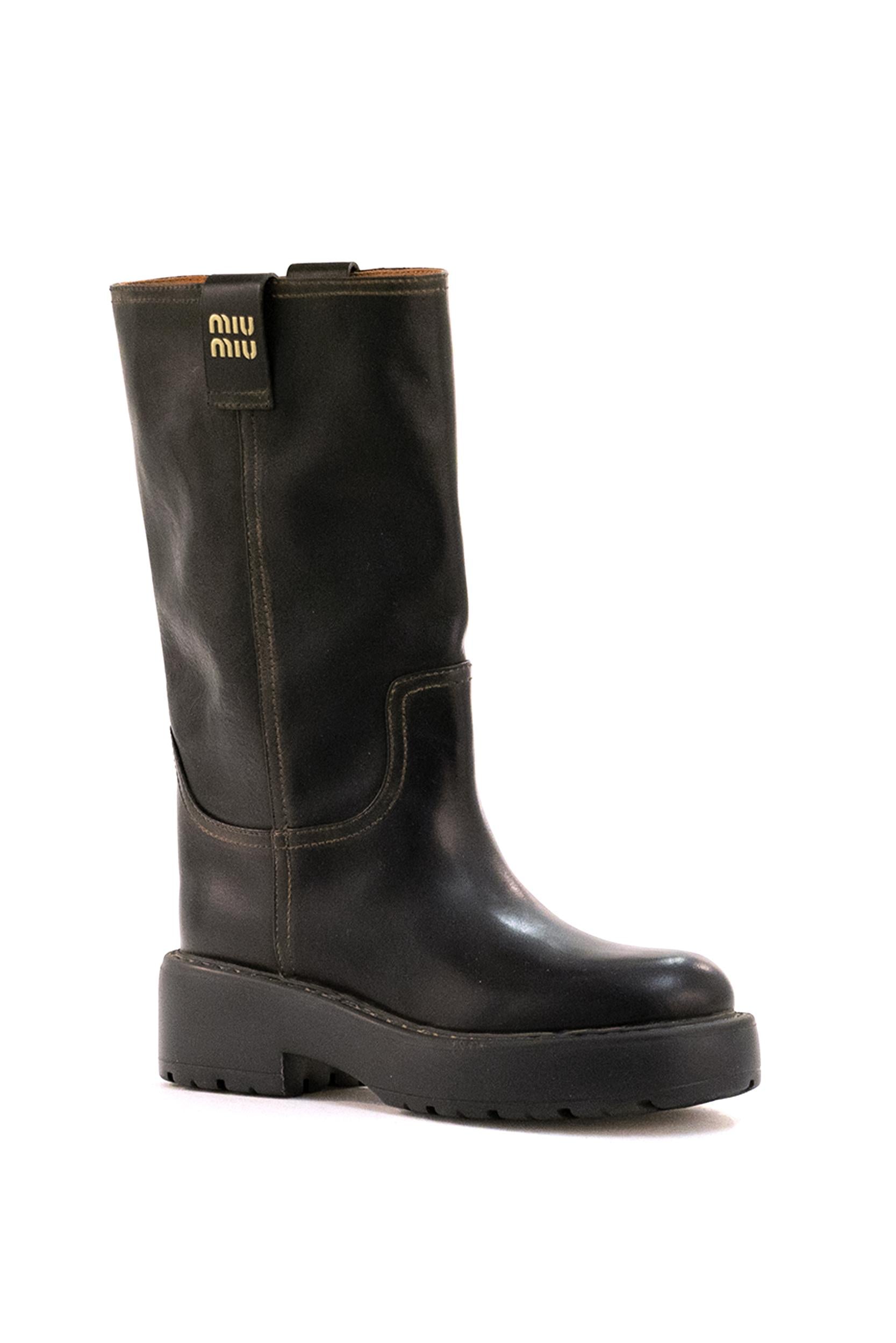 Stivali in pelle di colore nero<BR/> 5U270E F 055 5OD F0002 MIU MIU