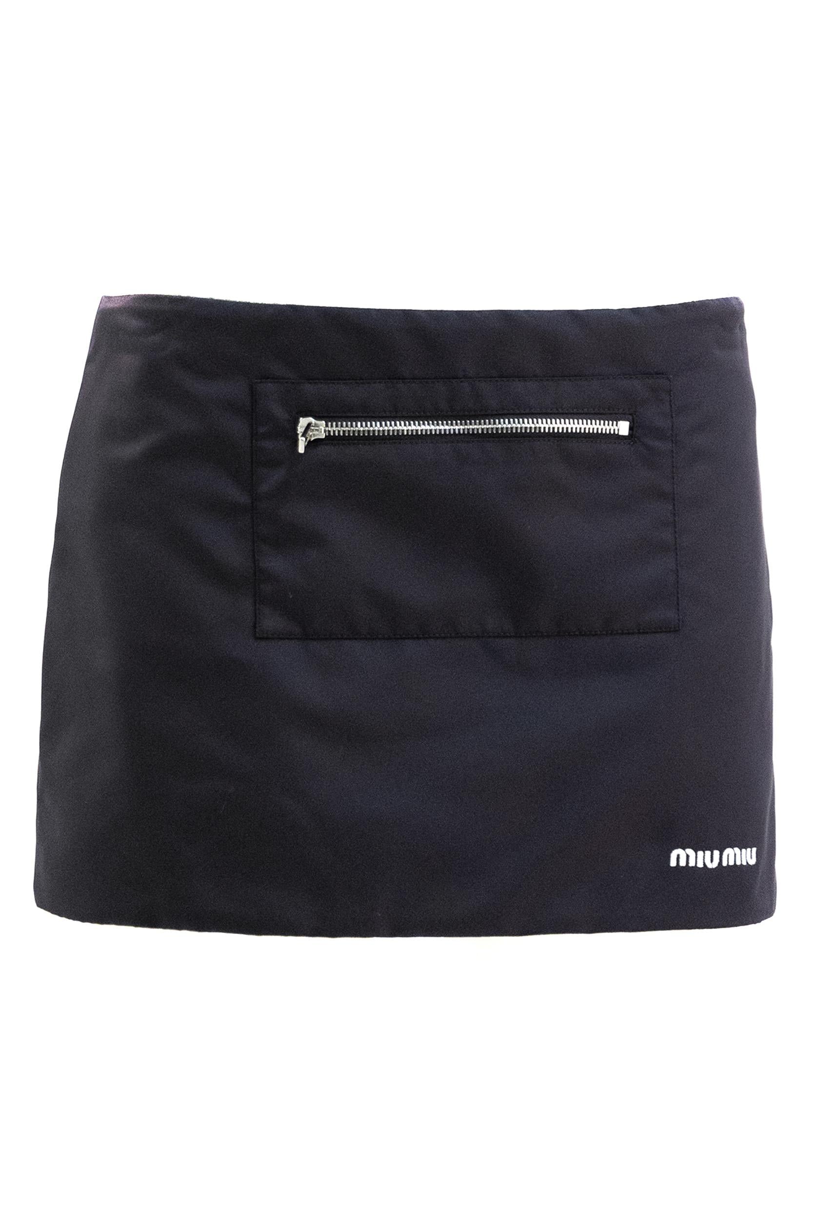 Gonna in gazare tecnico di colore blu <BR/> MG2583 S OOO 181A F0008 MIU MIU