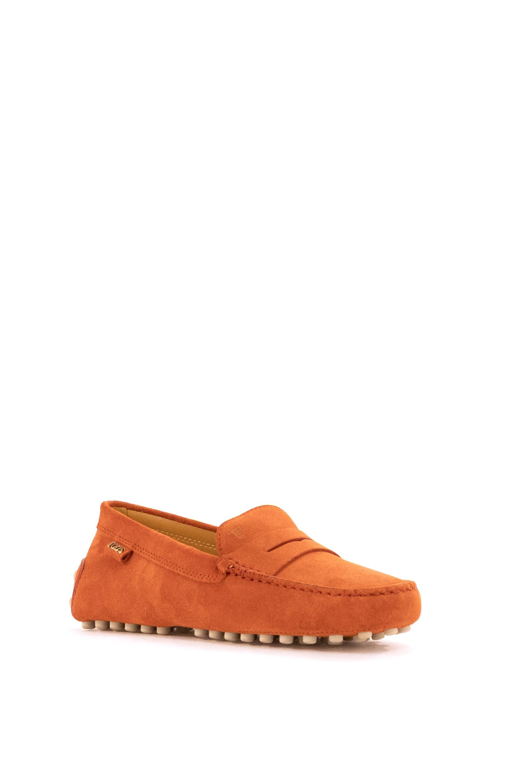 Mocassino Gommino in suede di colore arancio<BR/> XXW22L00010RE0 G833 TOD'S