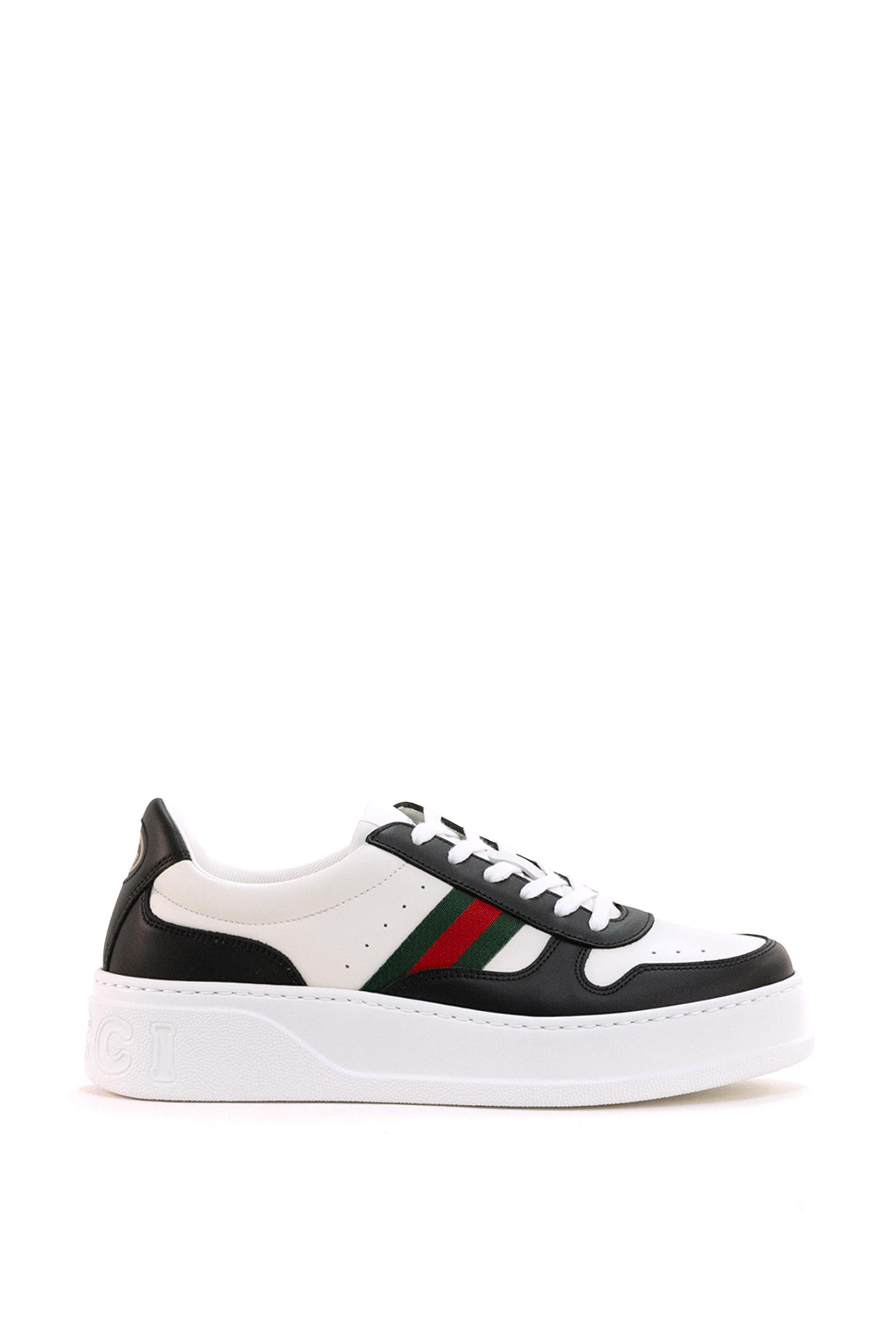 Sneakers in pelle di colore bianco e nero<BR/> 848307 AAE0H 1097 GUCCI
