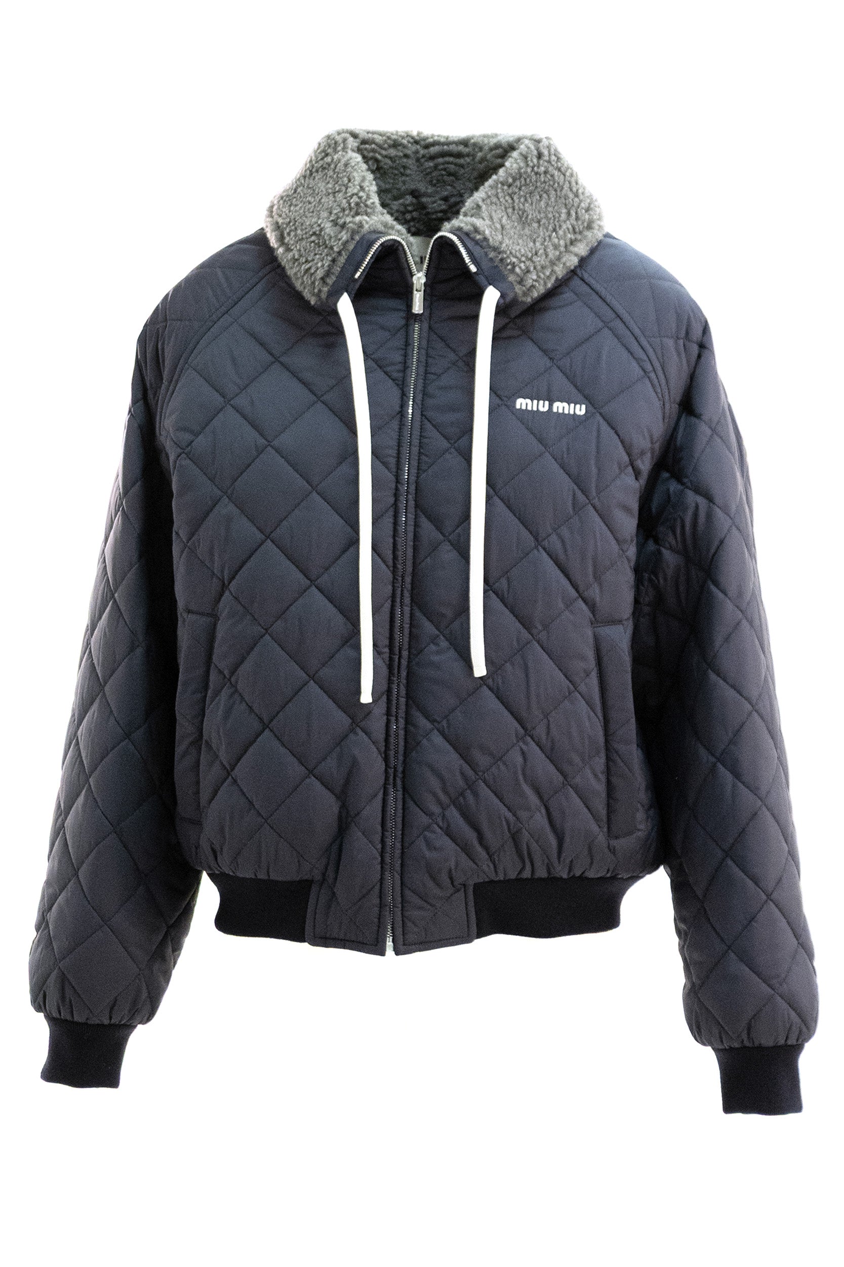 Bomber in tessuto tecnico trapuntato di colore blu<BR/> ML1548 S OOO 1J4E F0008 MIU MIU 