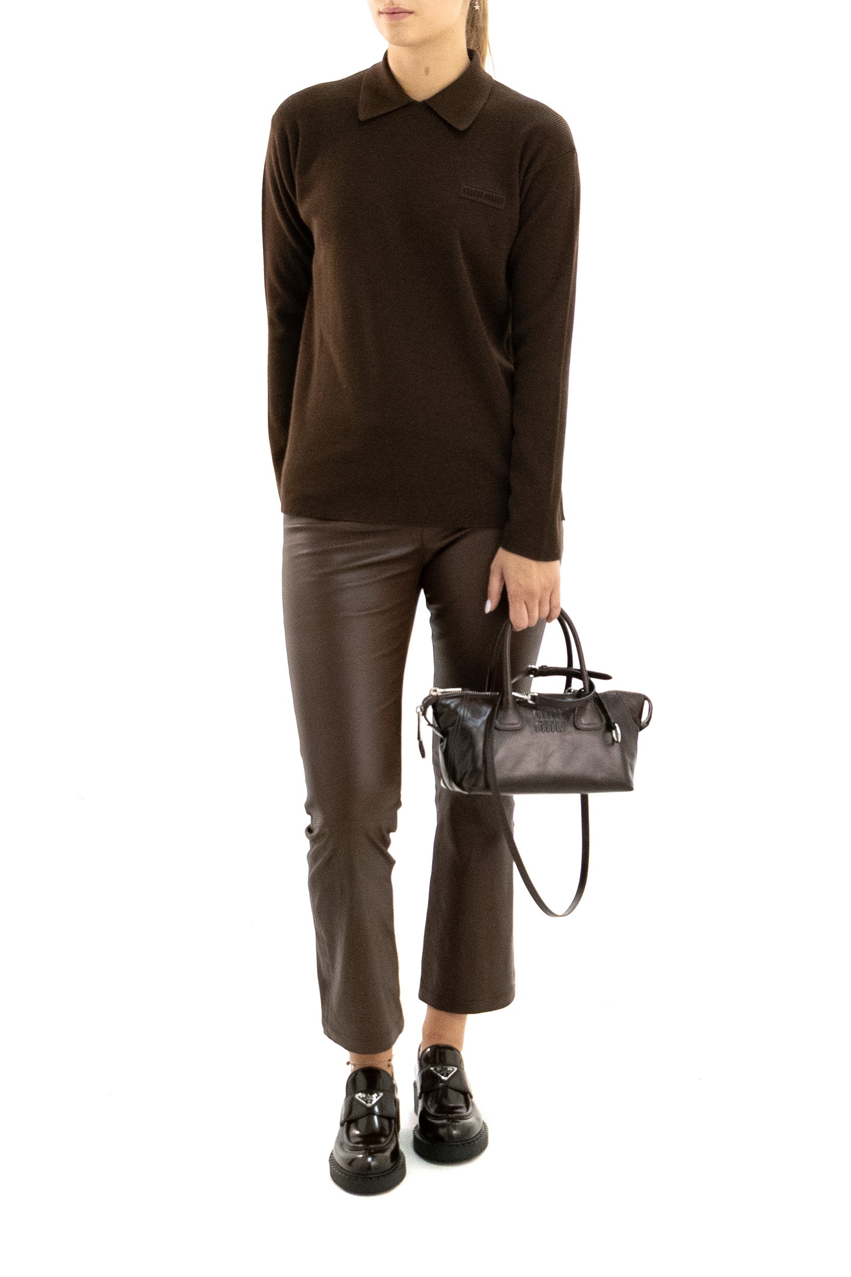 Polo in lana a coste di colore marrone<BR/> MML05U S OOO 1903 F0324 MIU MIU 
