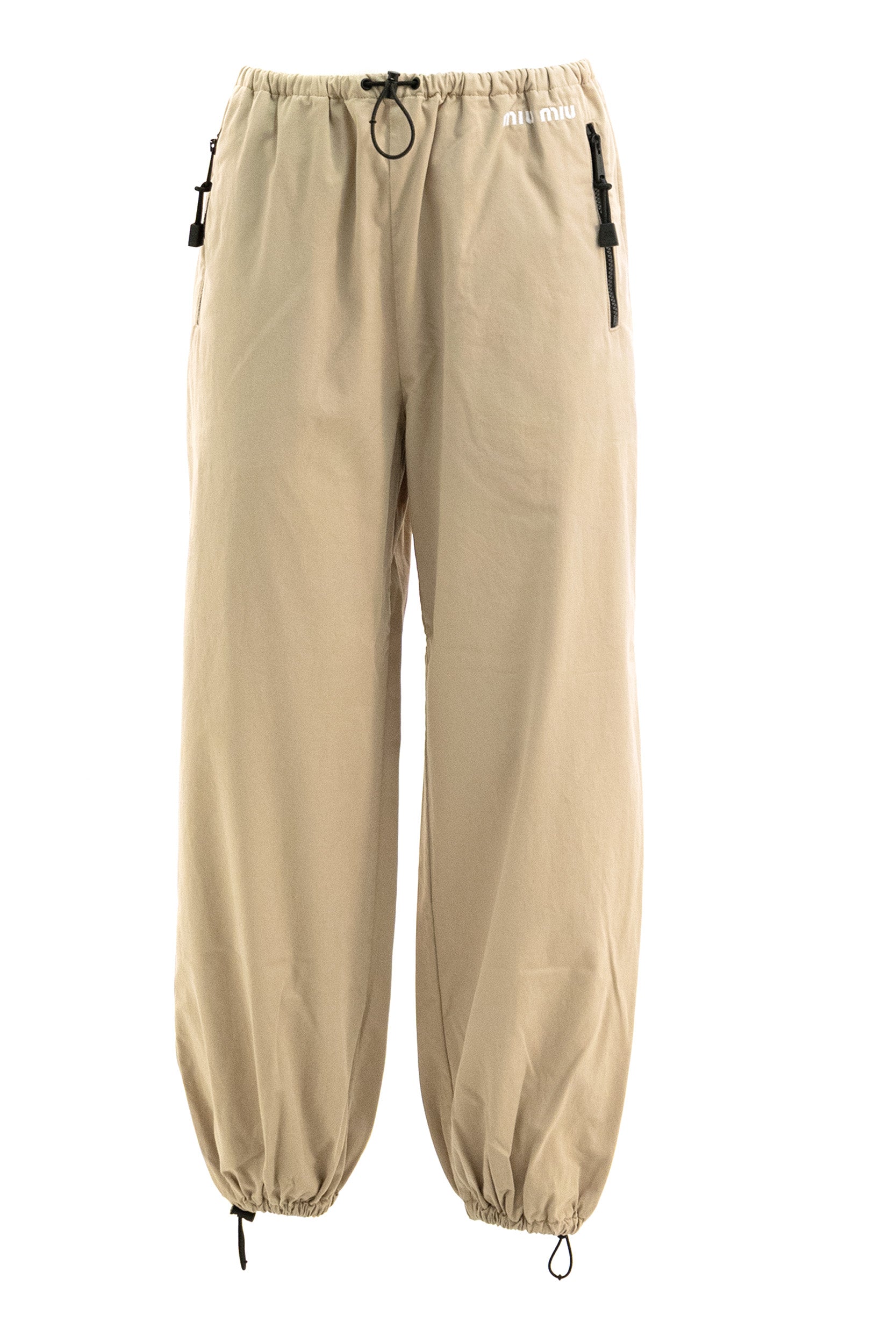 Pantaloni in gabardine di cotone di colore beige <BR/> MP2044 S OOO 19LW F0065 MIU MIU 