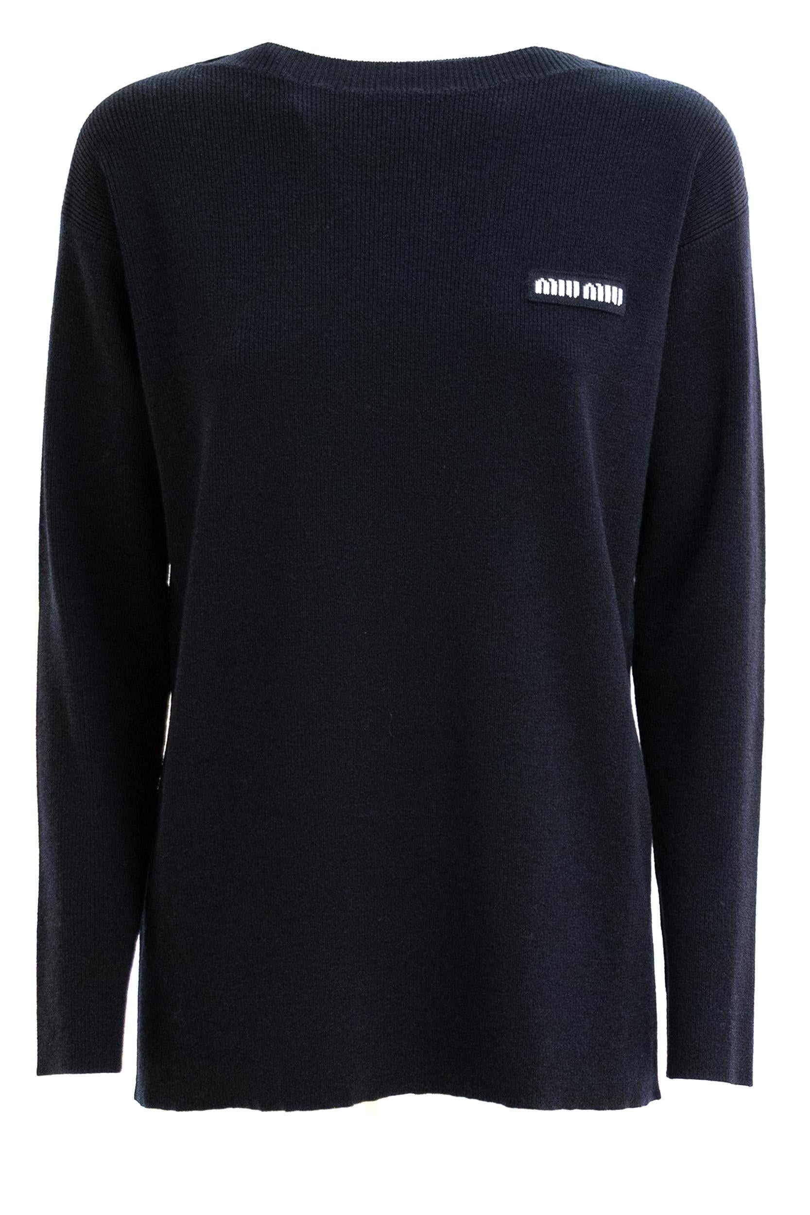 Pullover in lana a coste sottili di colore blu<BR/> MML06W S OOO 1903 F0008 MIU MIU 