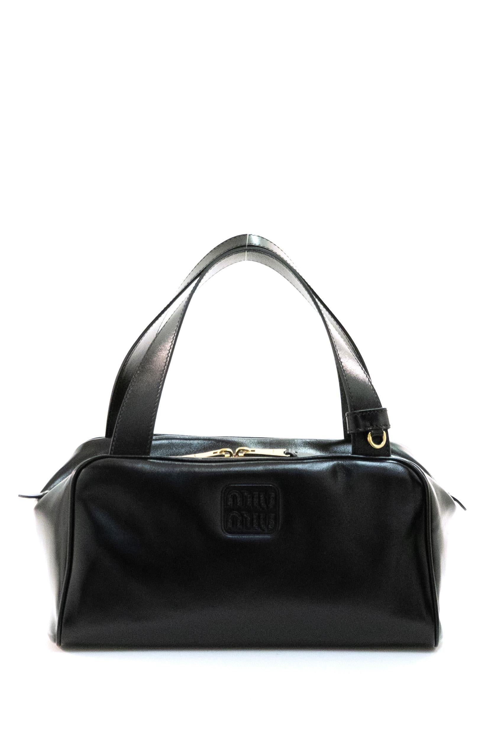 Borsa bauletto in pelle di colore nero<BR/> 5BB182 V MOO 2IEO F0002 MIU MIU 