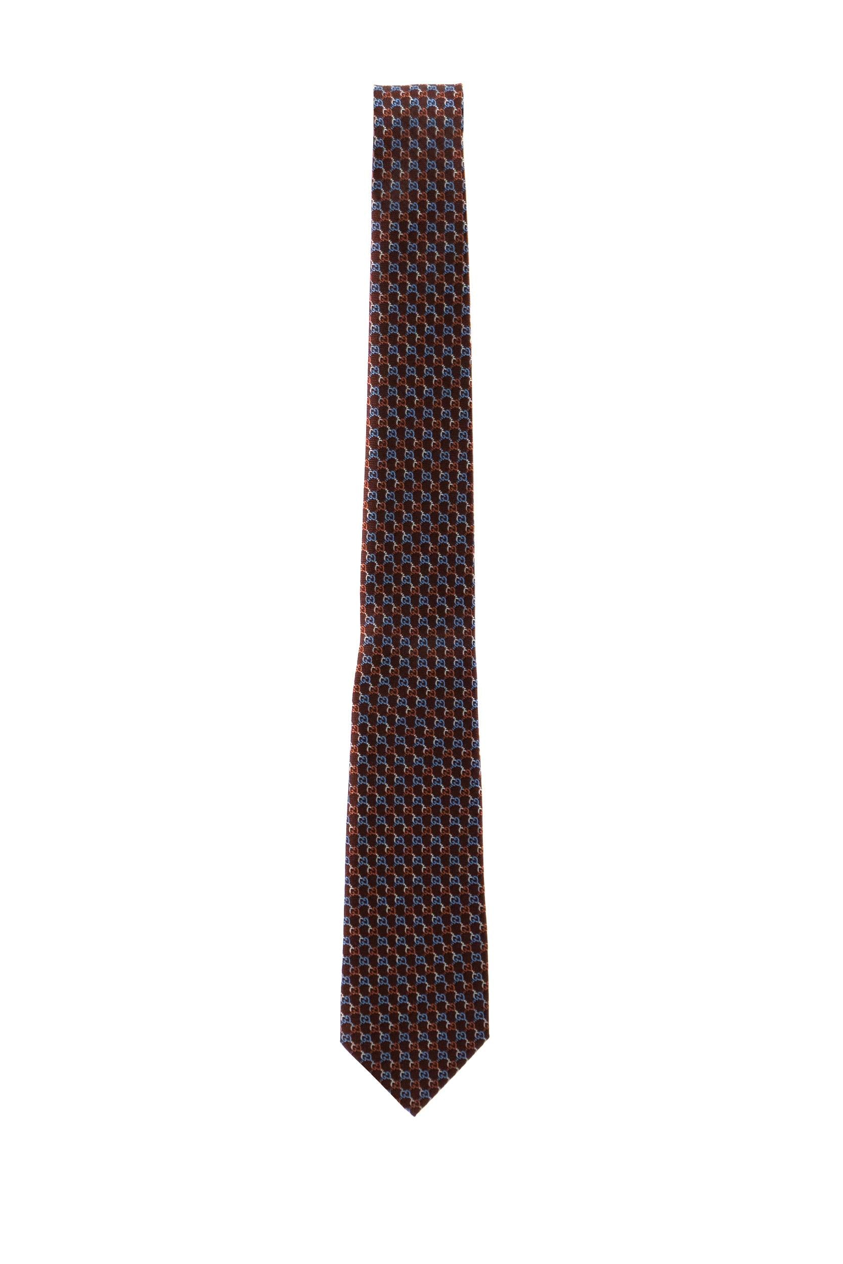 Cravatta in seta GG jacquard di colore rosso e azzurro<BR/> 853350 4E009 6469 GUCCI 