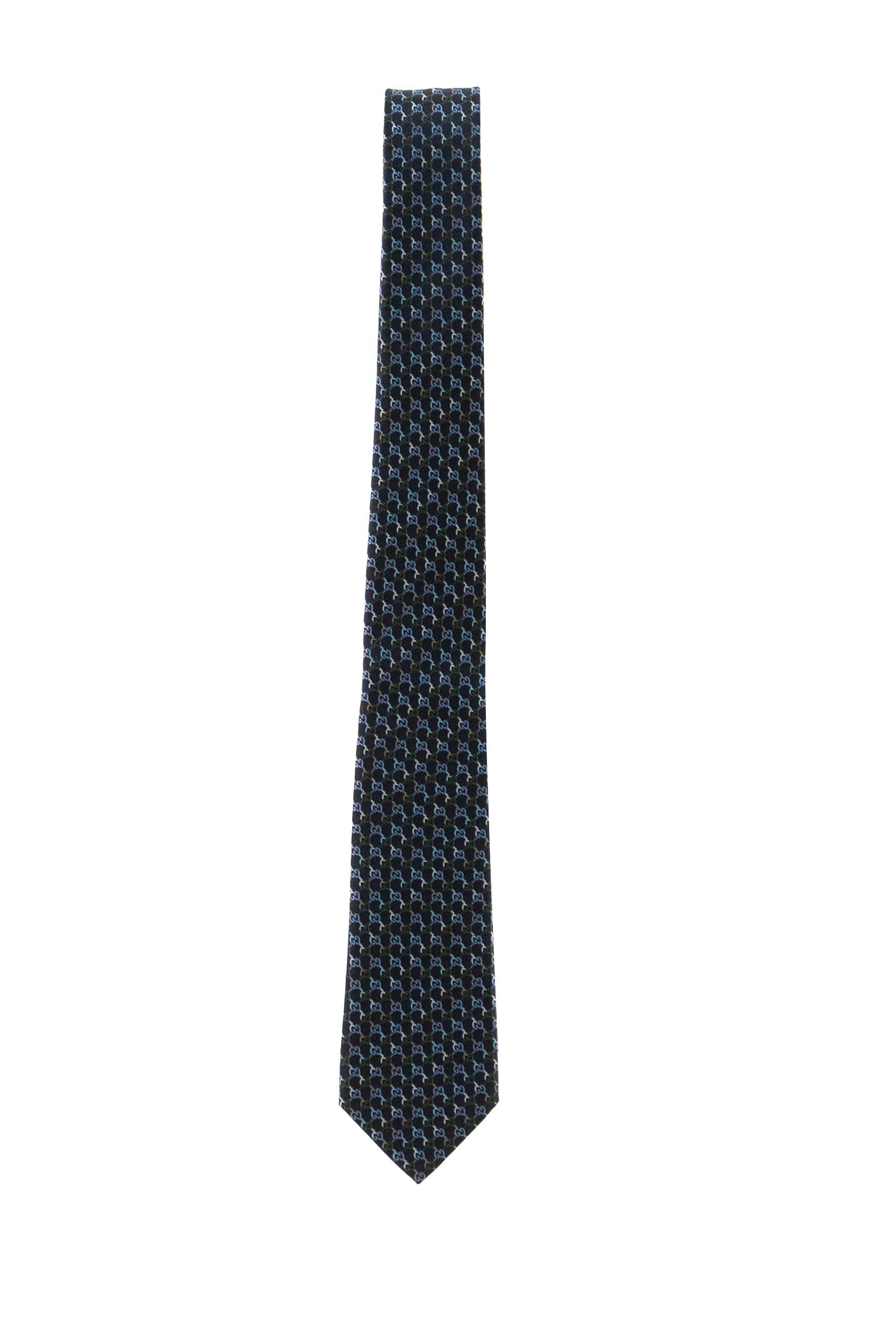 Cravatta in seta GG jacquard di colore blu e verde scuro<BR/> 853350 4E009 4266 GUCCI 