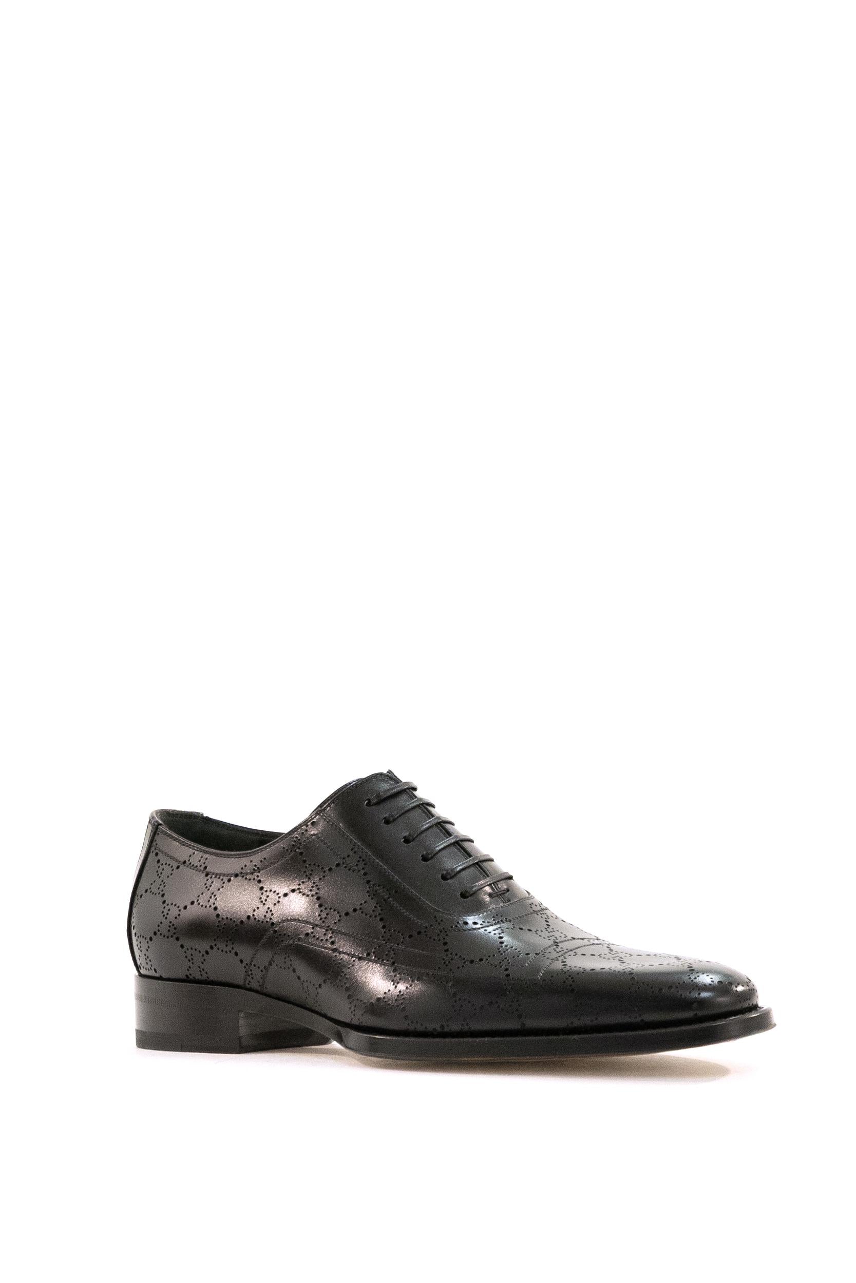 Scarpe in pelle di colore nero<BR/> 863019 AAGBV 1000 GUCCI 