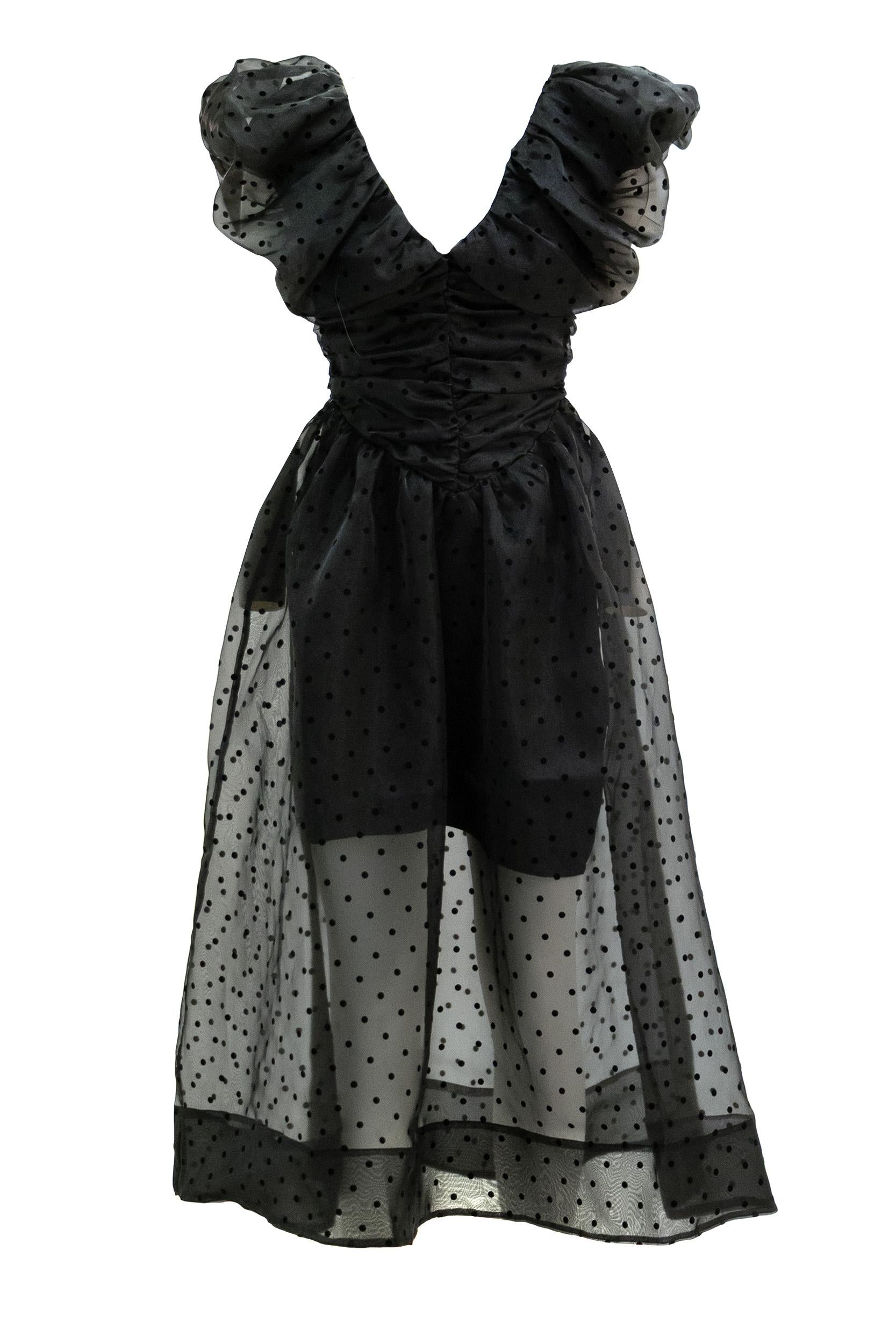 Abito in in organza a pois di colore nero<BR/> A1030107 099 GANNI 