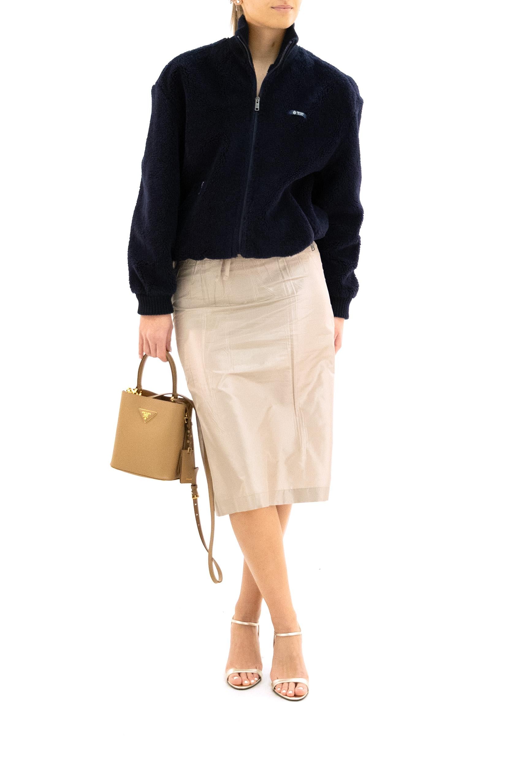 Gonna midi in taffetà di colore beige<BR/><BR/> P170Z S OOO 120M F0065 PRADA 