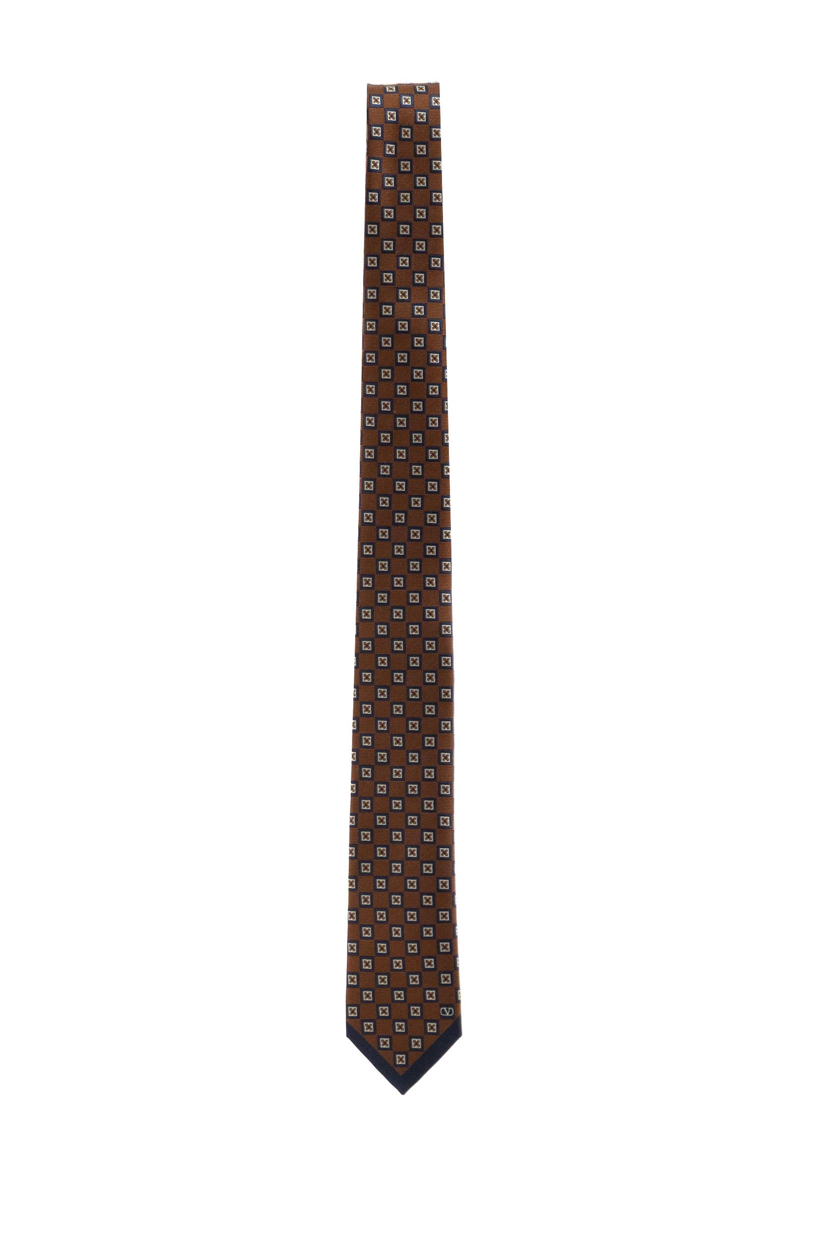 Cravatta Valentie in seta Jacquard con motivo geometrico di colore arancio e blu<BR/> 9Y2EV195YTN 0QA VALENTINO GARAVANI 