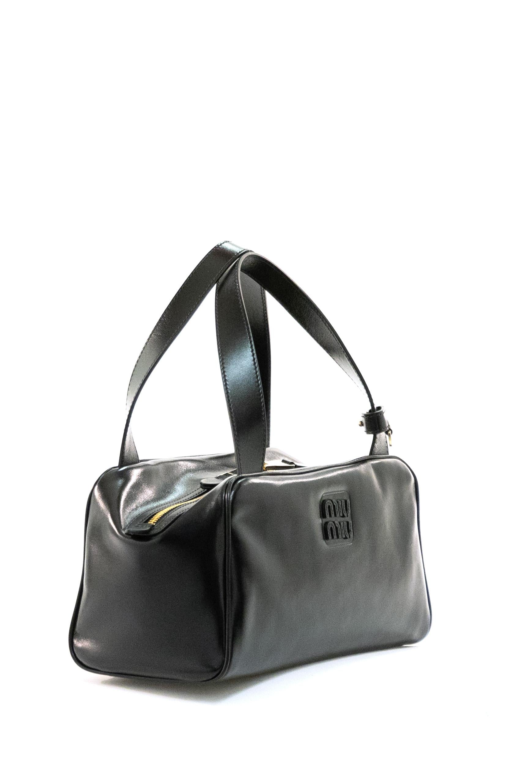 Borsa bauletto in pelle di colore nero<BR/> 5BB182 V MOO 2IEO F0002 MIU MIU 