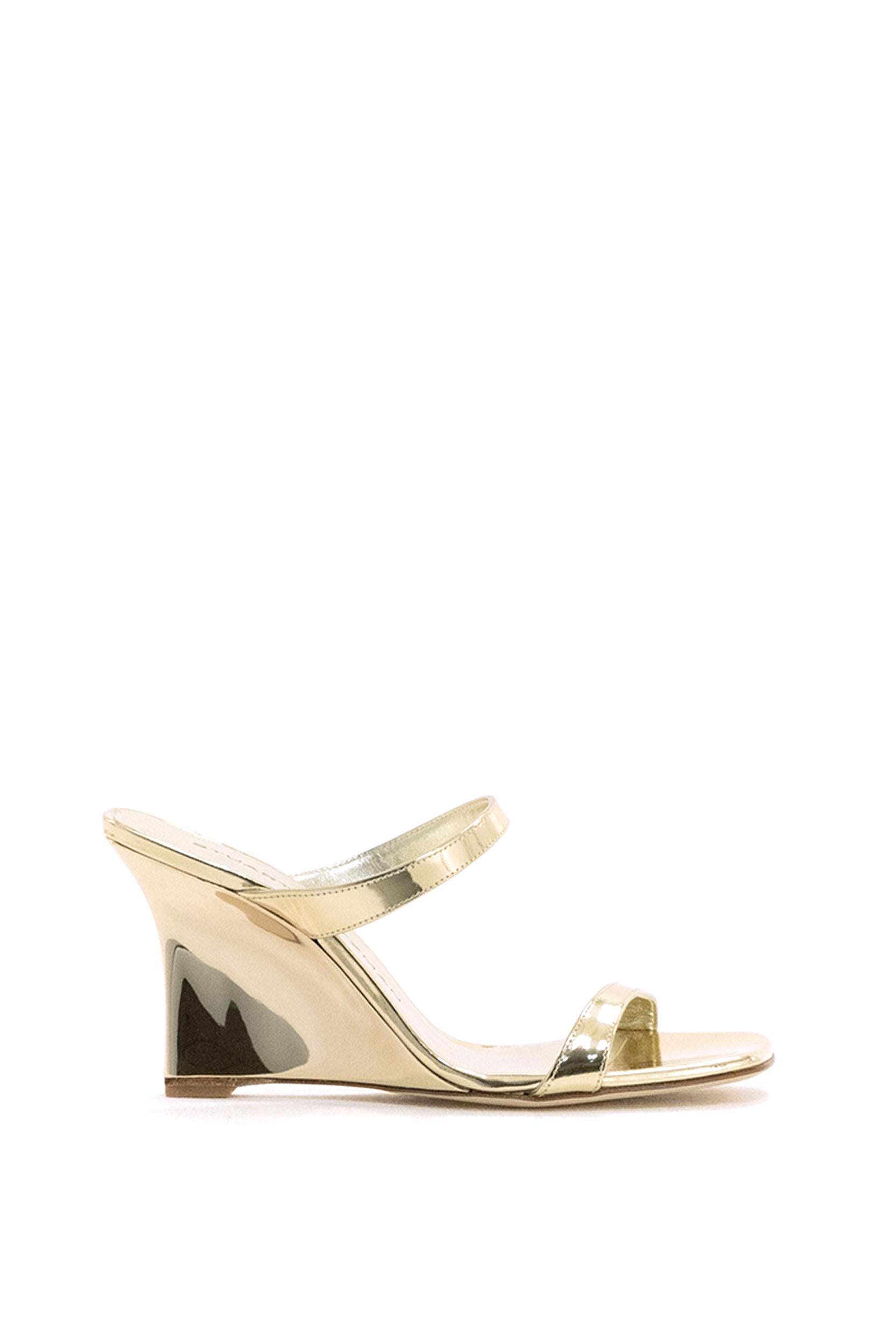 Sandali con zeppa Vinnie in pelle laminata color platino<BR/> VINNIE WEDGE SLIDE 8 PLATINO STUART WEITZMAN 