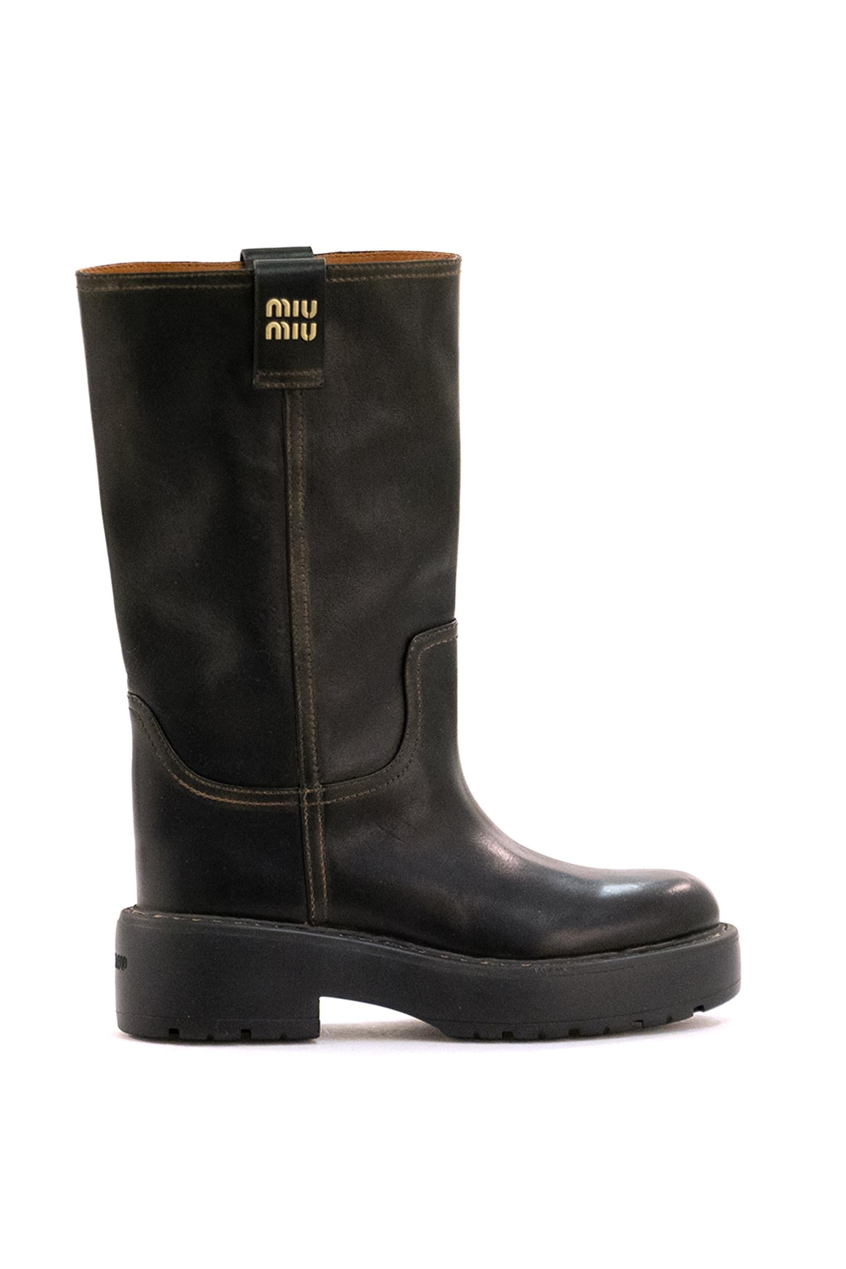 Stivali in pelle di colore nero<BR/> 5U270E F 055 5OD F0002 MIU MIU 
